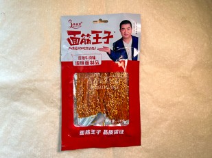 Арахис в глазури со вкусом буженина с чесноком: Мучные полоски КРАСНЫЕ со вкусом пряной говядины 76 гр